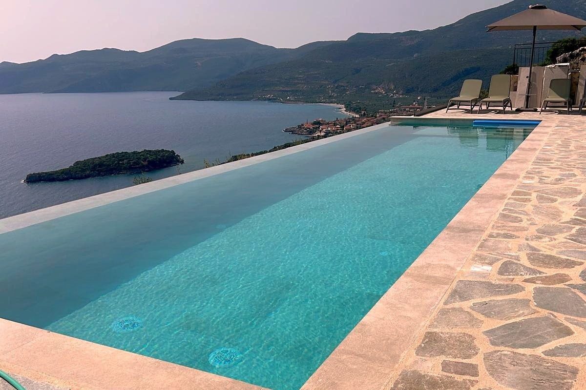 The 13-metre infinity pool, looking down the bay towards Kardamyli.